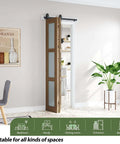 Double 15x84 Frosted Glass Barn Door Set in Brown Finish installed in a living room, showing water resistant PVC surface