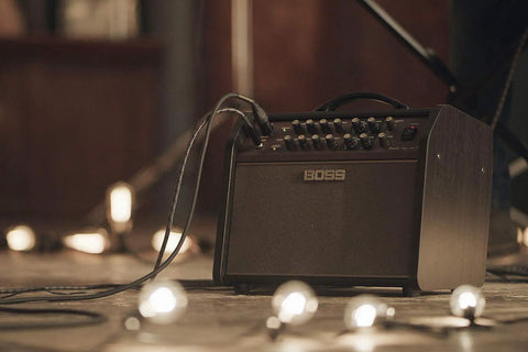 Gig-Ready Acoustic Singer Live LT 60-Watt Dual Channel Guitar Amp With Separate Mic And Guitar Inputs on stage with lights