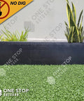 Extra Tall 4.75 Inch Black No Dig Yard Edging Kit for Landscaping and Flower Gardens with artificial grass and plants view
