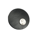 Large 3.025 Inch Diameter Ceramic Ferrite Disk Magnet next to a quarter for scale