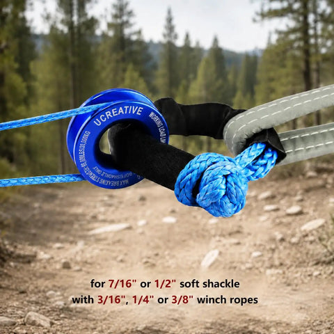 Heavy Duty Winch Recovery Ring 66000 Lbs For Soft Shackle And Synthetic Rope For ATV UTV SUV Truck Off Road Recovery Blue CNC Machined 7075 Aluminum Alloy in use on dirt trail.