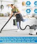 Person using vacuum with VF3500 Replacement Filter Two Pack For 4 Gallon Wet Dry Shop Vacuums, kitchen setting.