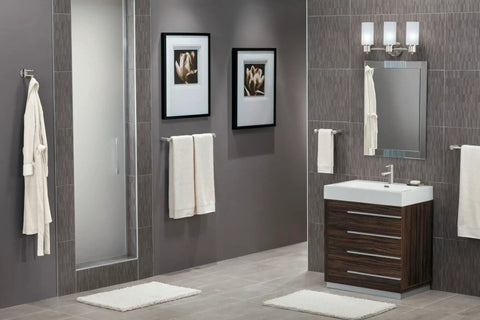 Align 24-Inch Modern Single Towel Bar In Brushed Nickel installed in contemporary bathroom with dark wood vanity and light walls