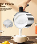Pouring foam from the 4 In 1 Milk Frother And Steamer With Detachable Wand, 900 Ml Capacity into a ceramic cup. Stainless steel design.