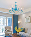 Blue 8 Light 30 Inch Large Pendant Chandelier With Candle Style Holders in modern living room setting
