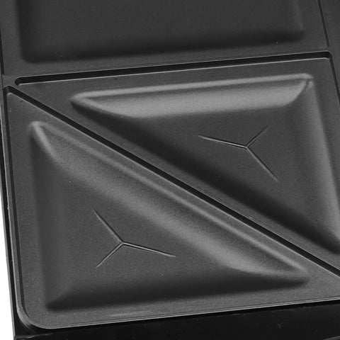 Close-up of the nonstick panini press surface of the Multifunctional Electric Breakfast Maker With Nonstick Panini Press Surface Features Double Sided Grilling For Cooking Donuts Waffles And Sandwiches In Your Kitchen Easy To Use Versatile Appliance.