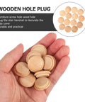 Hand holding Wooden Screw Hole Plugs For Furniture Easy Install No Fuss Decorative Covers 50 Pack Durable Wood Cabinet Hole Plugs