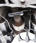 4 Pack 2.5 Inch Exhaust Clamps Heavy Duty U Bolt Saddle Design Muffler Pipe Connector in automotive exhaust system.