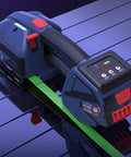 Get This Automatic Battery Powered Electric Strapping Made For PP Pet Banding Tensioner With High 900 To 3200 Newtons Strength And One Handed Operation For Fast Secure Sealing Without Buckles Or Manual Labor Hassles on a surface with green strap.
