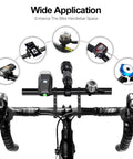 Long 11.8 Inch Aluminum Handlebar Extender For 31.8mm And 25.4mm Bike Bars with accessories like lights, phone, and bell.