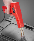 100W Plastic Welder Gun With 800 Hot Staples And Led Light Rapid Heating Bumper Repair Kit For Cars Kayaks And Toys in use on a black surface.