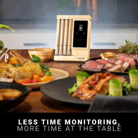 Four Probe Wireless Smart Meat Thermometer For Grill, BBQ, Oven, And Sous Vide displayed with cooked dishes