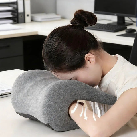 Woman using Comfort Enhancing Desk Headrest Pillow For Office Use Ergonomic Memory Foam Chair Neck Support while napping