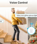 Man using voice to control staircase light with 3 Way Smart Light Switches With Voice And App Control Requires Neutral Wire And 2.4 GHz WiFi FCC Listed No Fuss Install Perfect 4 Pack For Any Home Smart Setup.