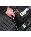 Mechanic using 85 Piece SAE And Metric Socket Set With One Quarter Inch, Three Eighths Inch And One Half Inch Drives on car engine