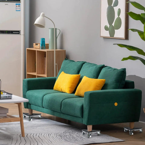 Heavy Duty Furniture Movers With 360 Degree Rotation Wheels And Lifter Set under green sofa with yellow cushions, rolling on hardwood floors.