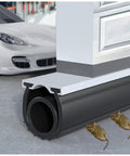 Close-up of Garage Door Bottom Seal Kit 16.5ft EPDM Rubber Weatherproof Seal installed on garage door, blocking rodents.