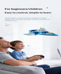 Father and son controlling Mini Kids Drone With Altitude Hold And 6 Axis Gyro, LED Lights, One Key Takeoff And Landing indoors