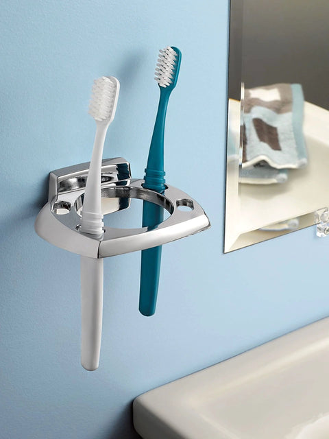 Chrome toothbrush holder with two brushes on bathroom wall, near Donnor Collection Chrome Wall Mount Hand Towel Ring 6.25 Inch Diameter.