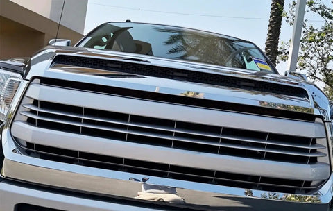 Front view of 2014-2021 Toyota Tundra with Smoked Lens Amber LED Grille Lights Kit installed, showing grille and lights detail.