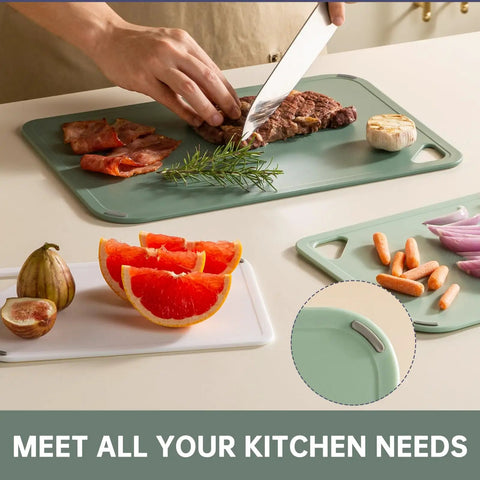 Set Of 3 Plastic Cutting Boards For Kitchen BPA Free Non Slip Dishwasher Safe Reversible With Grip Handles on kitchen counter