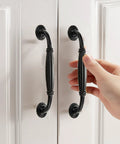 Matte Black Aluminum Alloy 10-Piece Drawer Handles Set For Kitchen Cabinets And Drawers, antique style pulls installed on white doors.