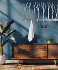 Rustic Winter Tree Grove Metal Wall Hooks, Minimalist Branch Design Coat Rack with towel and headphones in modern entryway