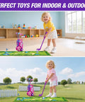 Toddler playing with Toddler Golf Set For Kids Ages 2 To 5 With 4 Plastic Clubs, 8 Soft Balls, Mat, Scoreboard, Bag, Golf Cart Toy Pink