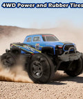 Waterproof Monster Truck Gesture RC Car With 4WD Amphibious All Terrain Drive kicking up dust on rocky terrain