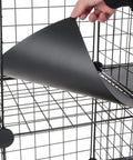 Person inserting PP sheet into 12 Inch Wire Storage Cubes Closet Organizer Set For Wardrobe And Garment Racks DIY Room Shelving System
