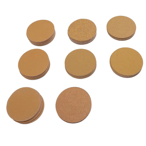 Top Tier 3 Inch Gold Aluminum Oxide Hook And Loop Sanding Discs With Hook Back For Orbital Sanders Smooth Woodwork Auto Body Metal Wall Finishing Pack Of One Hundred Sheets Durable Heavy Duty Abrasive Tool, multiple gold sanding discs.