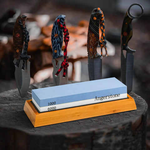 Premium Knife Sharpening Stone Whetstone 1000 6000 Grit With Non Slip Base on display with knives in background