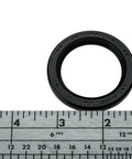 Mazda Crankshaft Seal B3C7-10-602A alongside rulers showcasing size and easy install for oil leak prevention in Mazda cars.