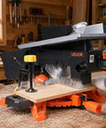 Two-In-One Miter And Table Saw With 8-1/4 Inch Blade, Precision Laser Alignment cutting wood with splash guard