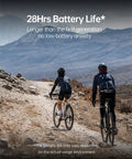 Two cyclists using the Gen2 GPS Bike Computer With Bluetooth on rocky terrain, showcasing 28 hour battery life and IPX7 waterproof build.