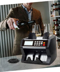 Cash counter machine on counter next to glasses, bottles; Two Pack Cash Counter Wheel Accessories For Fast, Smooth Money Handling At Banks And Supermarkets, Easy Install Parts For Cash Counter Machines, Boost Accuracy And Reliability In Daily Cash Management.