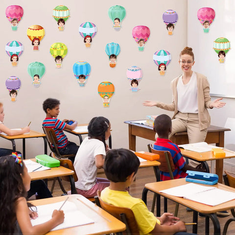 Classroom with Colorful Hot Air Balloon Cutouts Kit 60 Pcs 6 By 6 Inch Bulletin Board Decor on wall, teacher, and students.