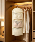 Compact Triple Tier Hanging Closet Organizer With Airy Mesh Pockets Ideal For Bras Bottoms And Socks, featuring three shelves with bras.