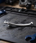 Super Cool Lurrose 2 Pack Electric Scooter Brake Levers Swap The Old Left And Right Disc Brake Handles For Universal Fitment On Your Mountain Bike Or Kick Scooter With Easy Install And Sleek Silver Finish, silver aluminum brake lever on workbench