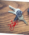 Everyday Carry Bottle Opener Keychain With Bicycle Pendant Multipurpose Lightweight Metal Lid Lifter For Bar And Car Keys Durable EDC Accessory Pack Of Ten on wooden table