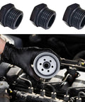 Battle Tested Aluminum Hex Adapter Fitting Kit Oil Coolant Plug High Temp Ethanol Compatible Fuel Line Hardware An4 To An12, two adapters and oil filter in hand.
