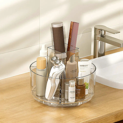 360 Degree Rotating Makeup Organizer Turntable on vanity with skincare bottles and brushes, five clear compartments.