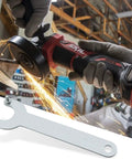 Heavy Duty Angle Grinder Wrench Set Compatible With 125 Mm And 150 Mm Tools Featuring Solid Steel Flats That Are Hella Rust Proof and Ride Or Die Tough For Every Shop Build. Close-up of wrench and angle grinder in use.