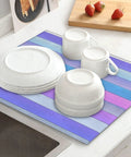 Wood Grain Print Dish Drying Mat 16x18 Inches under white dishes and cups on a kitchen counter