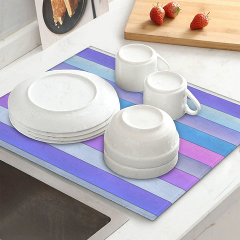 Wood Grain Print Dish Drying Mat 16x18 Inches under white dishes and cups on a kitchen counter