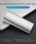 Heavy Duty M 2 B Key To Type C External Enclosure With Usb 3 1 Port For B Key Ssd Up To Two Terabytes Sleek Aluminum Body Portable Drive Docking Station on a desk