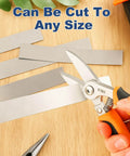 Cutting 50 Pcs Shim Stock Assortment in 304 Stainless Steel Shims 1 Inch Wide by 6 Inches Long with scissors
