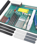 Pro 33 Piece Model Tools Kit For Gundam And Car Models, Hobby Craft Set For Building, Repairing, And Detailing Toys visible on a green cutting mat