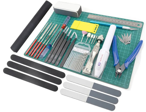 Pro 33 Piece Model Tools Kit For Gundam And Car Models, Hobby Craft Set For Building, Repairing, And Detailing Toys visible on a green cutting mat