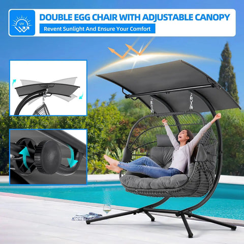 Double Egg Chair With Removable Adjustable Canopy for Outdoor Hangout Patio near pool, featuring cushioned basket.